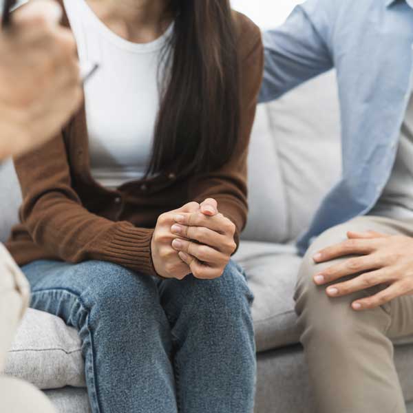 Couple sitting on a sofa